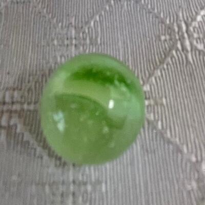 Green cat eyes with bubbles