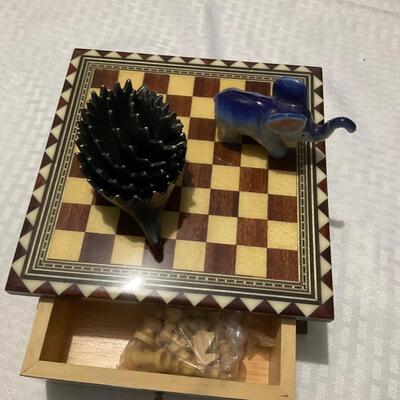 Chessboard with elephant & metal hedgehogs