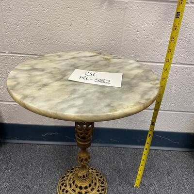 Ornate marble and brass table