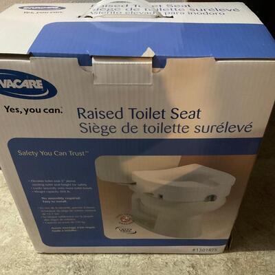 Raised toilet seat