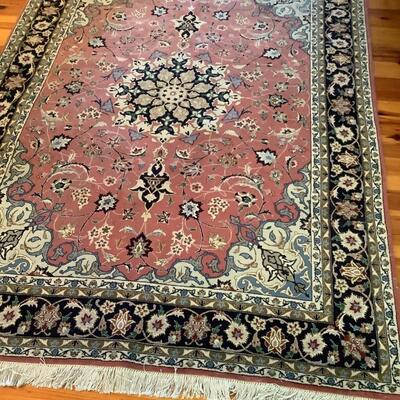 Persian hand-knotted rug