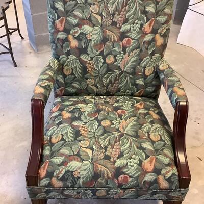 2 upholstered arm chairs with wooden legs and arms with slip covers