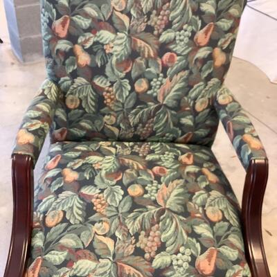 2 upholstered arm chairs with wooden legs and arms with slip covers