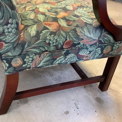 2 upholstered arm chairs with wooden legs and arms with slip covers