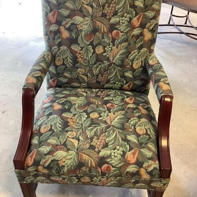 2 upholstered arm chairs with wooden legs and arms with slip covers