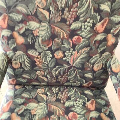 2 upholstered arm chairs with wooden legs and arms with slip covers