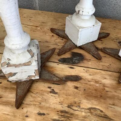 Reimagined candlesticks, wooden posts, metal stars from hurricane rods