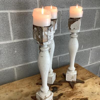 Reimagined candlesticks, wooden posts, metal stars from hurricane rods