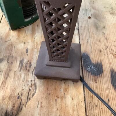 Vintage Bow & stern running lights shown with candles and a lamp