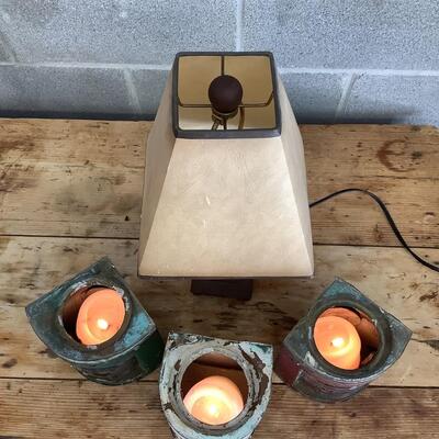 Vintage Bow & stern running lights shown with candles and a lamp