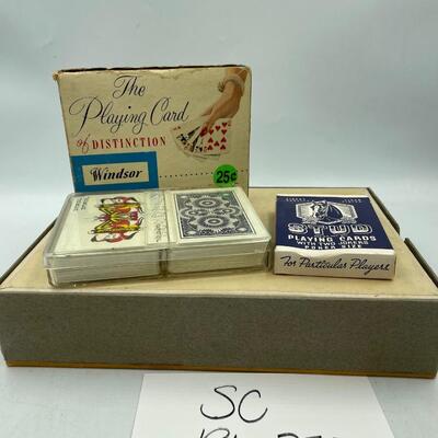 Vintage woven funeral home fan and some playing cards