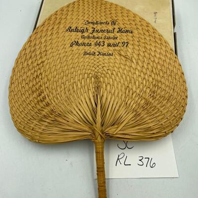 Vintage woven funeral home fan and some playing cards