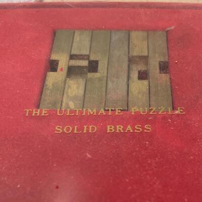 Brass and wood puzzles