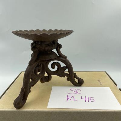 Cast iron candle stand