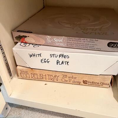 8!! Eight different egg trays for deviled egg service. 2 Glass Pizza dishes