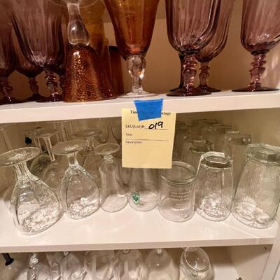 Clear and colored wine glasses and goblets, drinking glasses