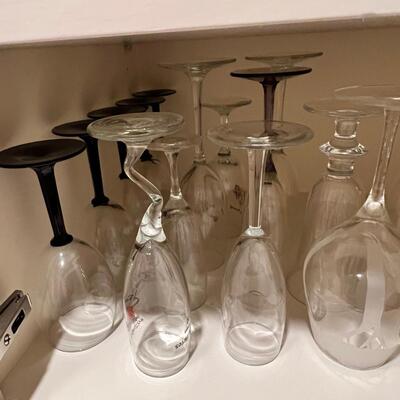 Clear and colored wine glasses and goblets, drinking glasses