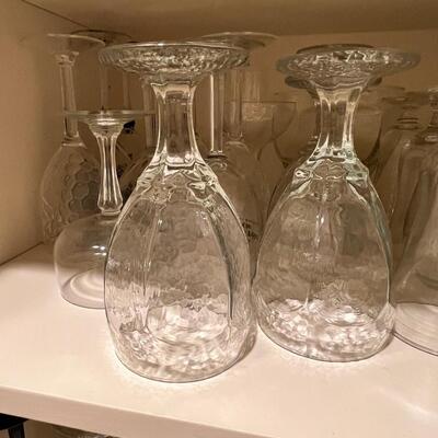 Clear and colored wine glasses and goblets, drinking glasses