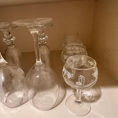 Clear and colored wine glasses and goblets, drinking glasses