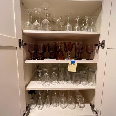 Clear and colored wine glasses and goblets, drinking glasses