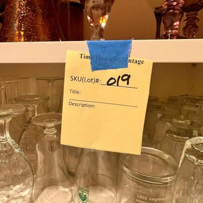 Clear and colored wine glasses and goblets, drinking glasses