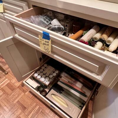 2 drawers filled with tapers , candle bases tea lights holders
