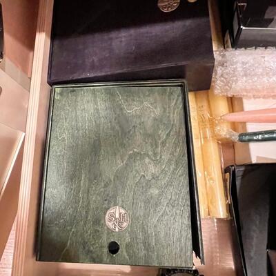 2 drawers filled with tapers , candle bases tea lights holders
