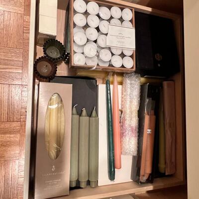 2 drawers filled with tapers , candle bases tea lights holders