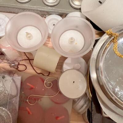 2 drawers filled with tapers , candle bases tea lights holders