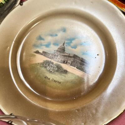 Table full of collectible glass and ceramics,  Noritake Quail plate with COA