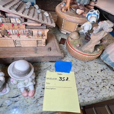 Holiday music boxes and figurines