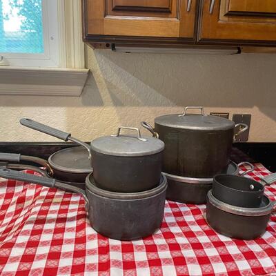 7-piece set of vintage Magnalite Professional cookware | EstateSales.org