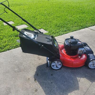 Self propelled 21'' Yard Machine push lawn mower.  Starts right up. Only used a few times.