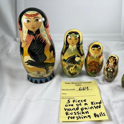 Five hand painted one of a kind Russian nesting dolls, signed