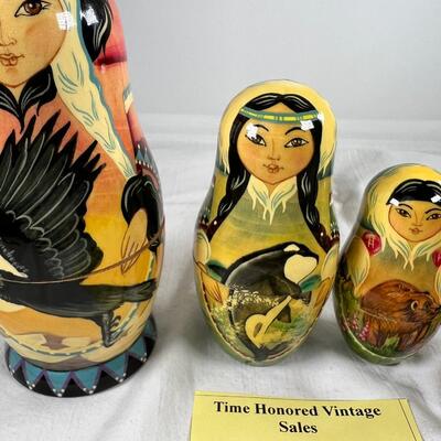 Five hand painted one of a kind Russian nesting dolls, signed