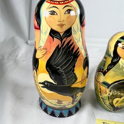 Five hand painted one of a kind Russian nesting dolls, signed