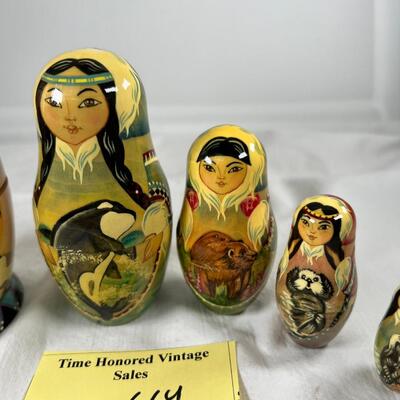 Five hand painted one of a kind Russian nesting dolls, signed