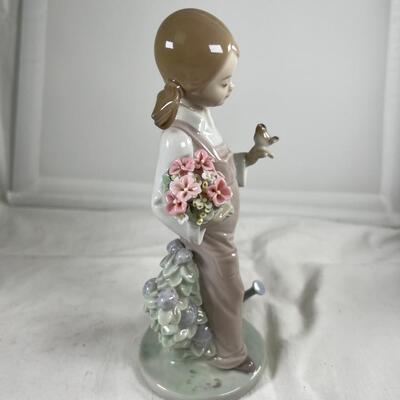 LLadro #521 Porcelain glazed Pigtail girl with bird  7.5" tall no box