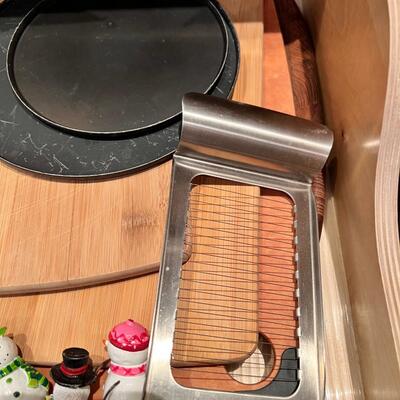 Knives, hand beaters, and kitchen utensils