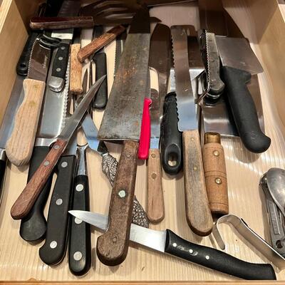 Knives, hand beaters, and kitchen utensils