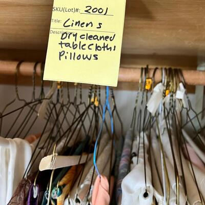 Linens, tablecloths, many pillows
