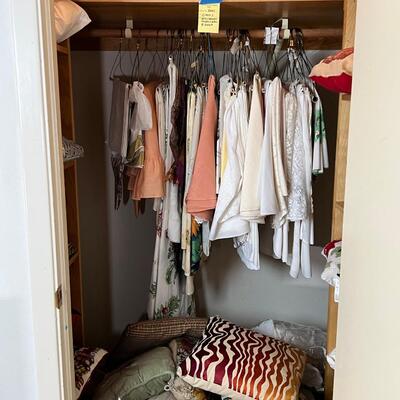 Linens, tablecloths, many pillows