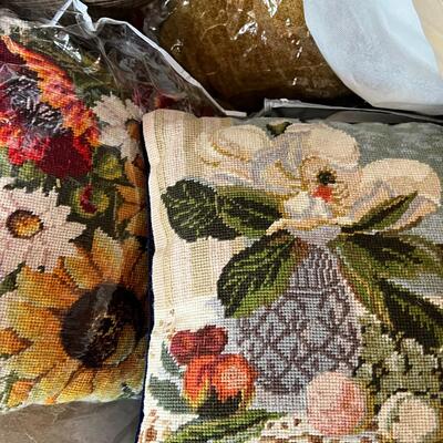 Linens, tablecloths, many pillows