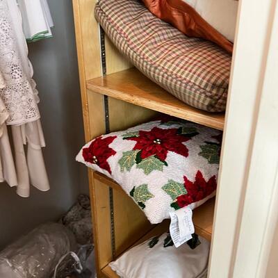 Linens, tablecloths, many pillows