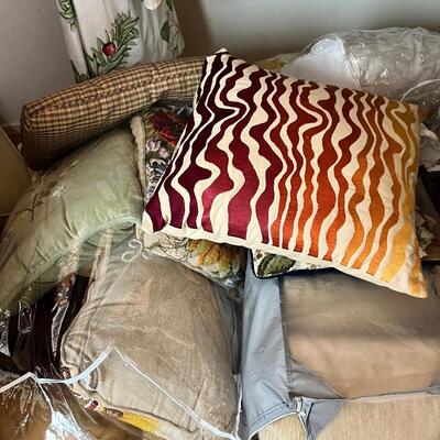 Linens, tablecloths, many pillows