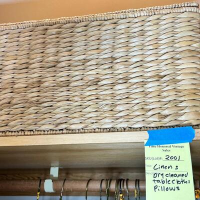 Linens, tablecloths, many pillows