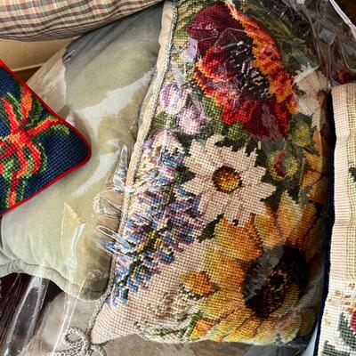 Linens, tablecloths, many pillows