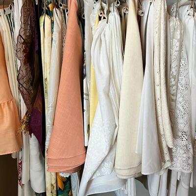 Linens, tablecloths, many pillows