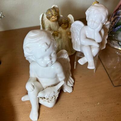 Angels and fairies, 2 ceramic  Bells, 2 larger candle holders 1 new in box