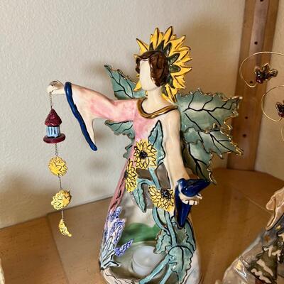Angels and fairies, 2 ceramic  Bells, 2 larger candle holders 1 new in box